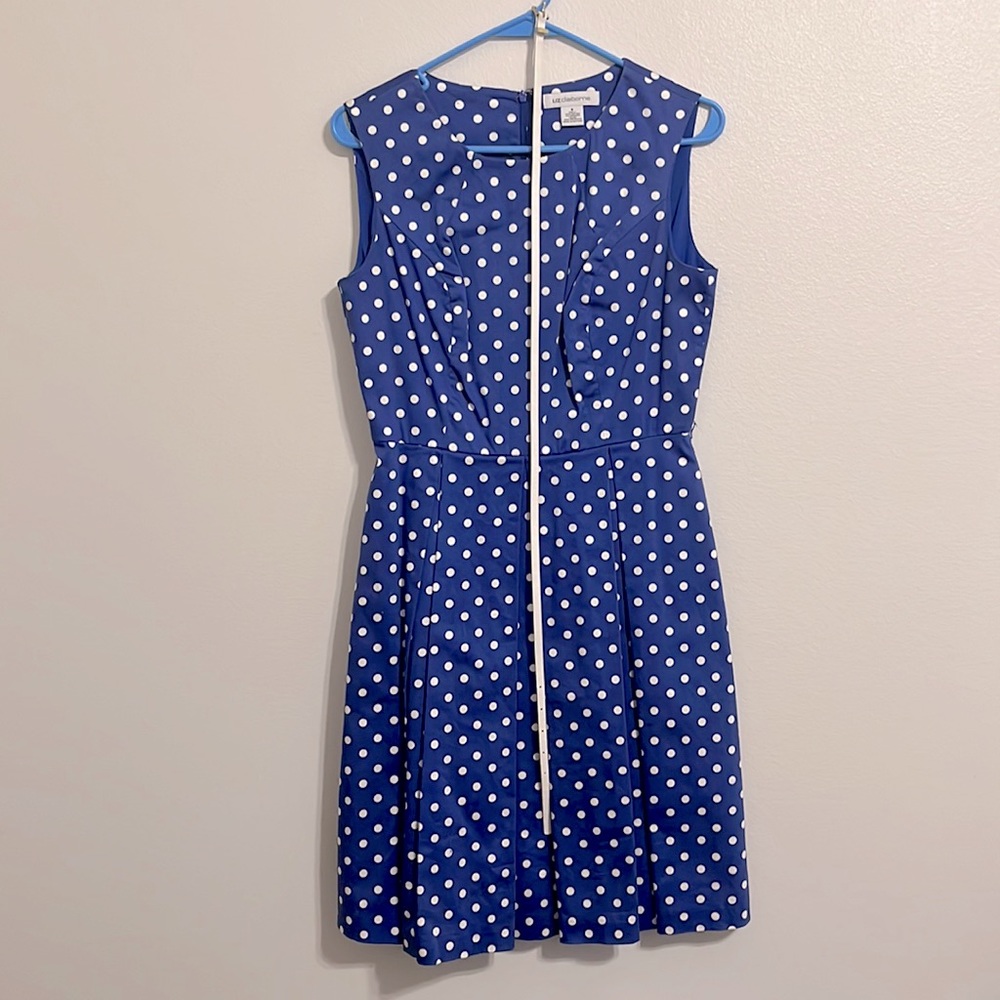 Blue and white polka dot business attire dress with white belt